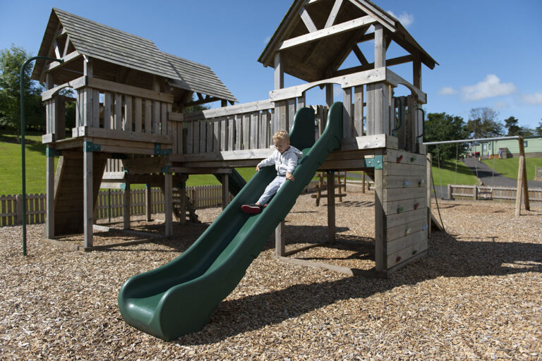 causey hill boy on slide